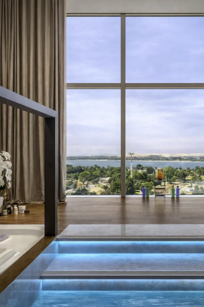 Elegant bathroom with scenic lakeside view